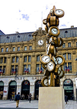 Time runs differently when you're vacationing in Paris. Sculpture at Gare St-Lazare, Paris. Photo © David McSpadden, via flickr and creative commons